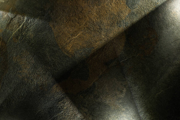 светлая призма с балками на темном фоне из камня
