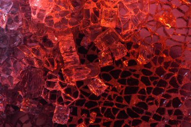 top view of abstract red and black ice textured background clipart