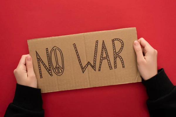 Cropped View Woman Holding Cardboard Placard War Lettering Red Background — Stock Photo, Image
