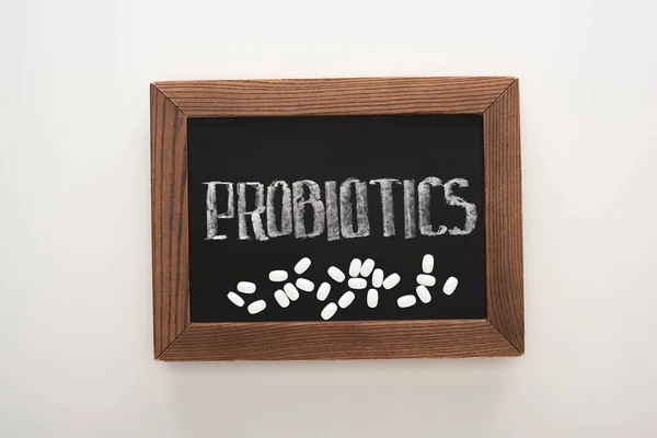 Top View Chalkboard Probiotics Lettering Pills White Background — Stock Photo, Image