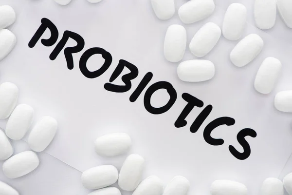 Vista Dall Alto Carta Con Probiotici Lettering Pillole Sfondo Bianco — Foto Stock