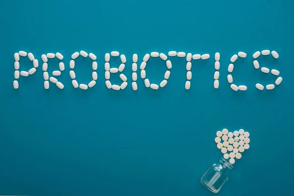 Top View Probiotics Lettering Heart Made Pills Glass Jar Blue — Stok Foto
