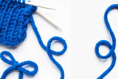 blue wool yarn and knitting needles on white background clipart