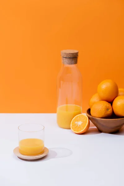 Fresh Orange Juice Glass Bottle Oranges Bowl White Surface Isolated — Stock Photo, Image