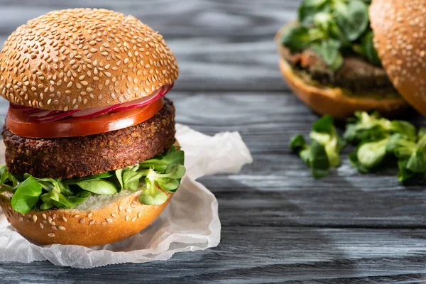 Selective Focus Tasty Vegan Burgers Microgreens Vegetables Served Wooden Table — Stock Photo, Image