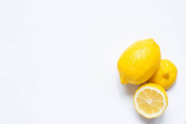 top view of fresh lemons on white background clipart