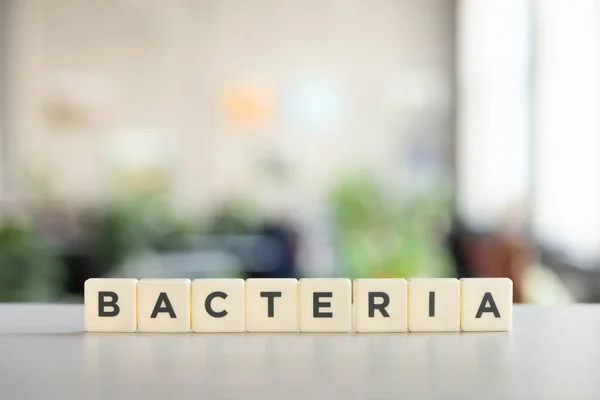 White Cubes Bacteria Word White Surface Covid Concept — Stock Photo, Image