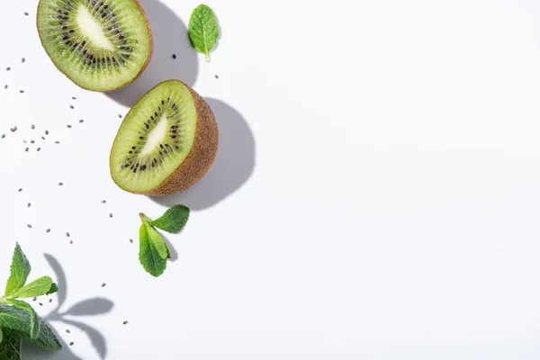 Top View Ripe Kiwi Fruits Fresh Peppermint Black Seeds White — Stock Photo, Image