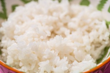 selective focus of white rice in bowl  clipart