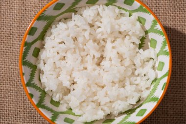 top view of white rice in bowl  clipart