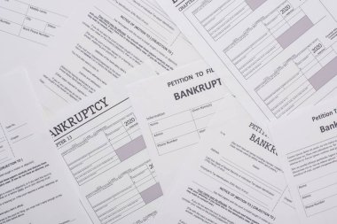 top view of bankruptcy petition papers clipart