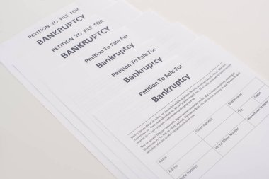 bankruptcy petition papers on white background clipart