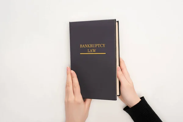 Partial View Woman Holding Bankruptcy Law Book White Background — Stock Photo, Image