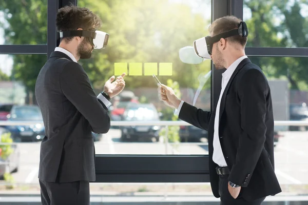 Businessmen with vr headsets — Stock Photo