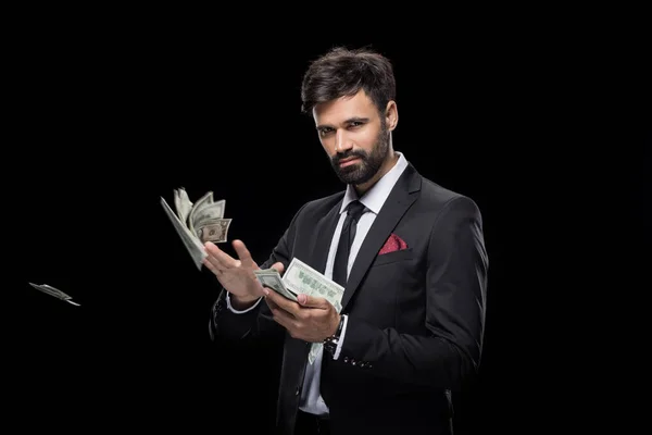 Hombre de negocios tirar dinero — Stock Photo