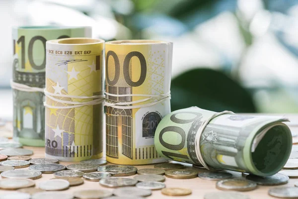 Euro banknotes and coins — Stock Photo