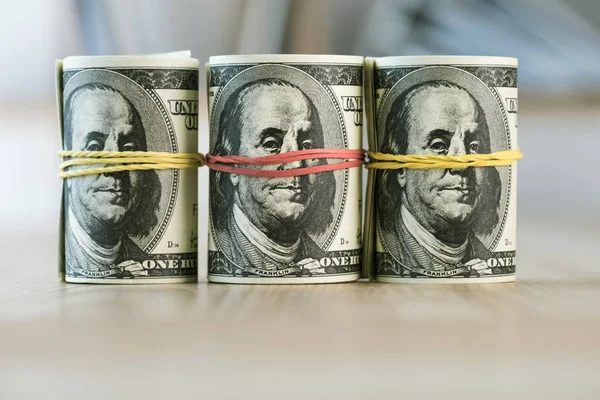 Rolled dollar banknotes — Stock Photo