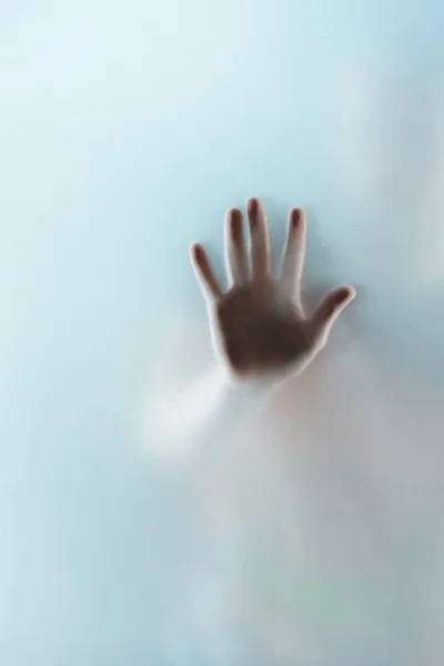 Hand touching glass — Stock Photo