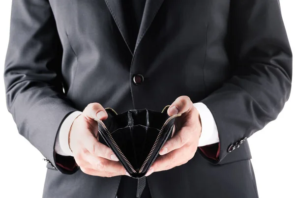 Businessman holding empty wallet — Stock Photo