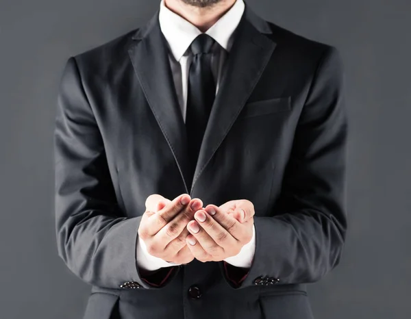 Businessman with open hands — Stock Photo