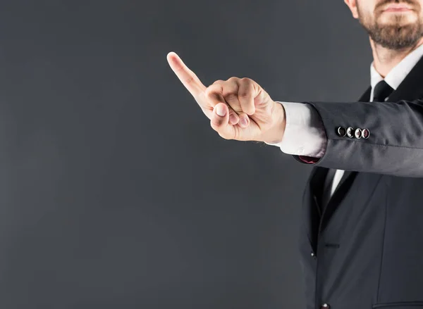 Businessman pointing with finger — Stock Photo