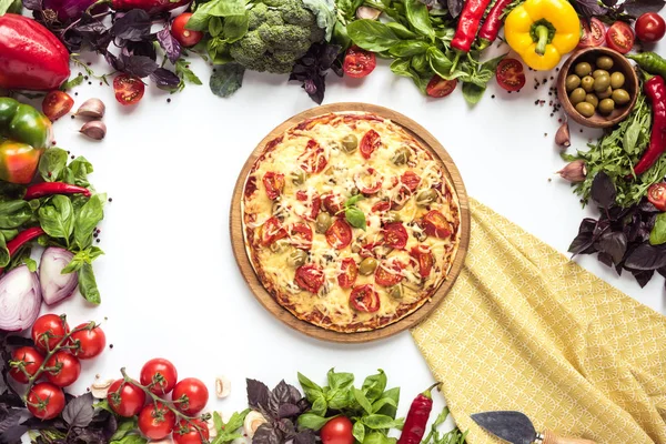 Homemade pizza and ingrediaents — Stock Photo