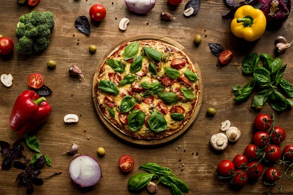 Pizza with fresh herbs — Stock Photo