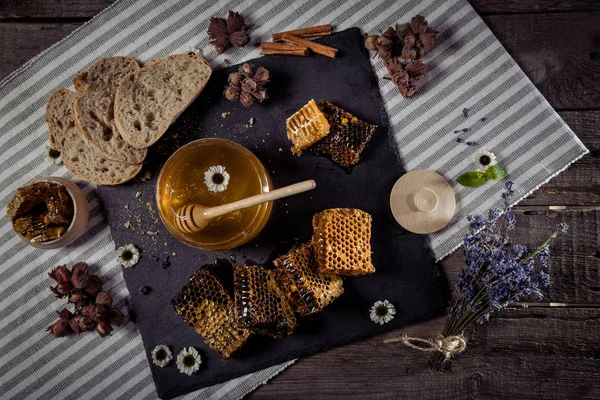 Honey and homemade bread — Stock Photo