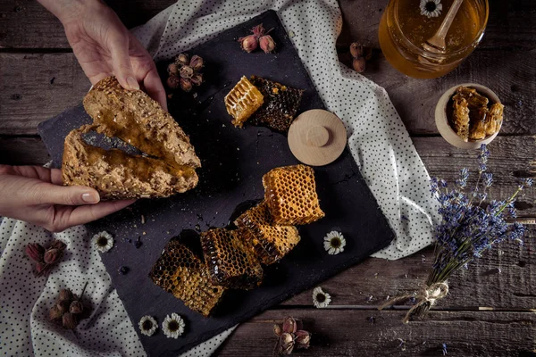 Honeycombs and homemade bread — Stock Photo