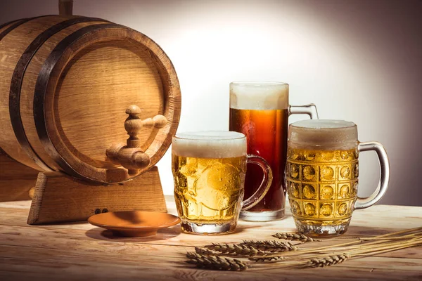 Barrel and different beer — Stock Photo