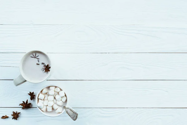 Cups of cacao with marshmallow and anise stars — Stock Photo