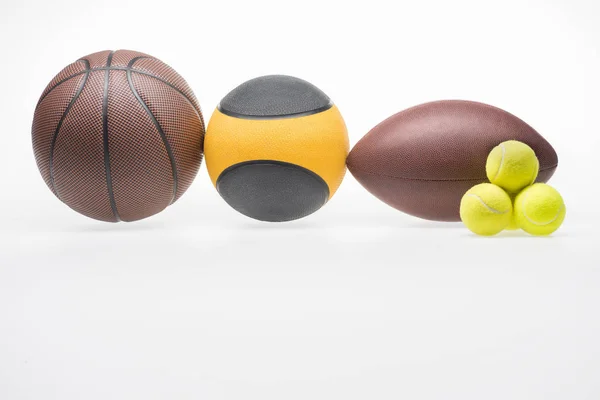 Sport balls in a row — Stock Photo