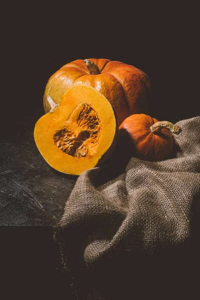 Ripe pumpkins on sackcloth — Stock Photo