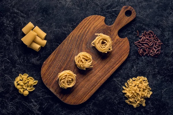 Composition of various raw pasta — Stock Photo