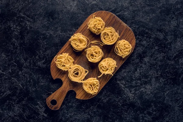 Raw pasta nests — Stock Photo