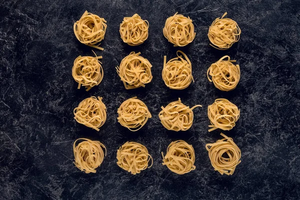 Raw pasta nests — Stock Photo