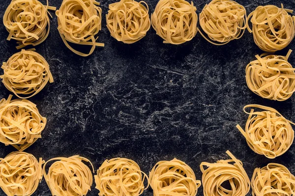 Frame made of raw pasta — Stock Photo