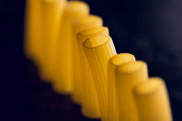 Pasta standing in row — Stock Photo