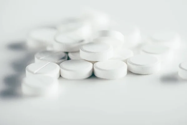 Round white tablets — Stock Photo