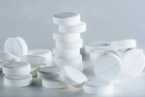 Round white tablets — Stock Photo