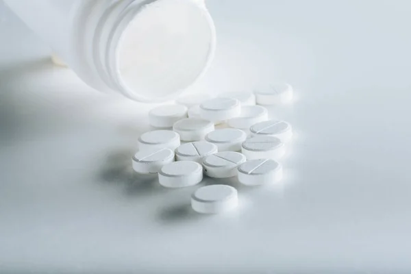 Round white tablets — Stock Photo