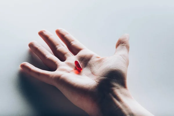 Medicine in hand — Stock Photo