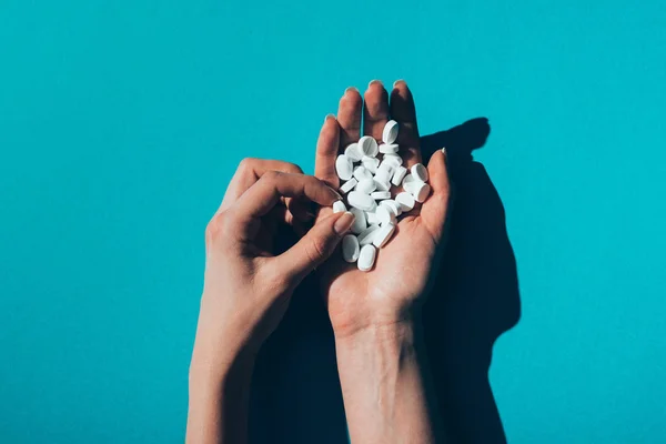 Pills in hands — Stock Photo