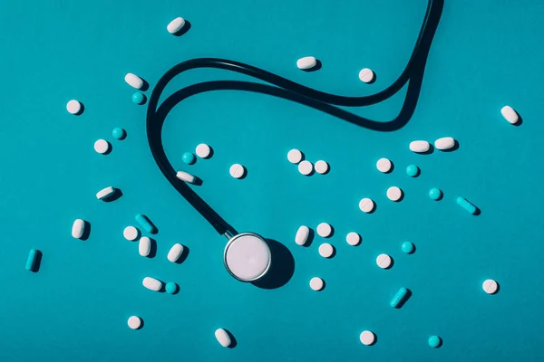 Pills and stethoscope — Stock Photo