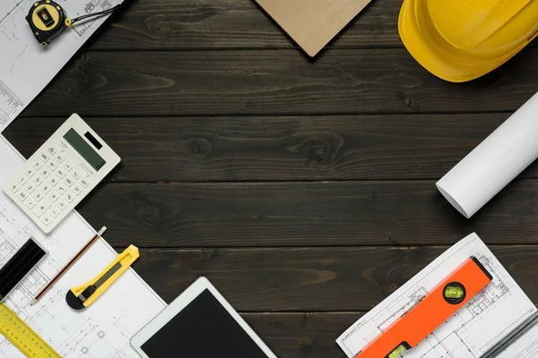 Tablet and architectural supplies — Stock Photo