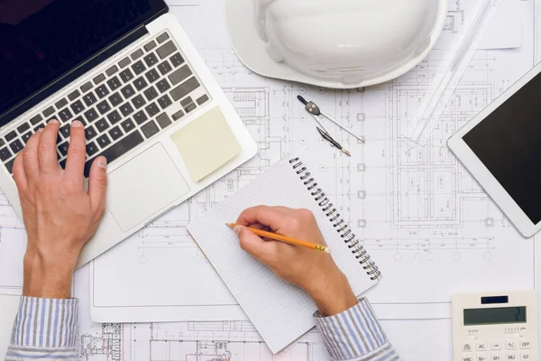 Architect working on laptop — Stock Photo