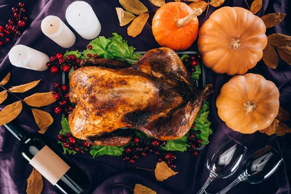 Baked turkey with pumpkins — Stock Photo