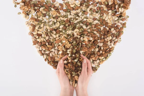 Human hands and various nuts — Stock Photo