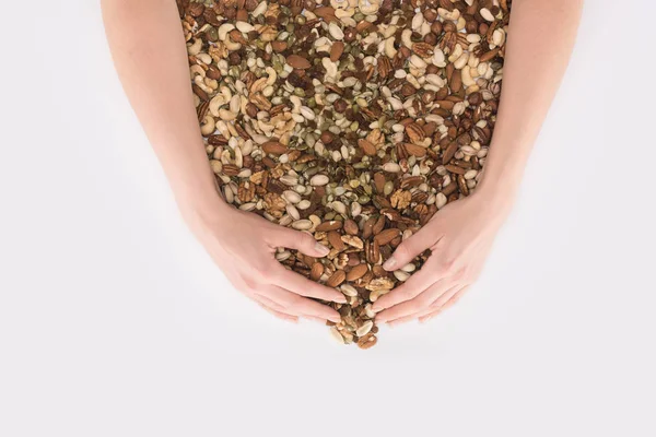 Various nuts in hands — Stock Photo