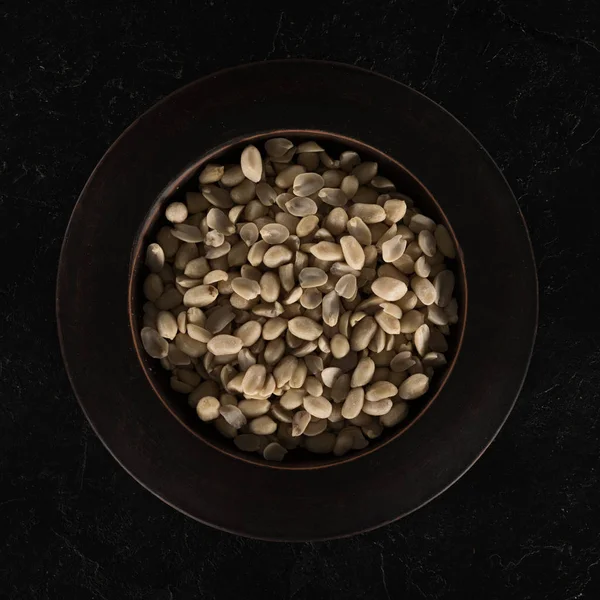 Peanuts on plate — Stock Photo